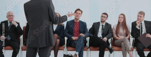 Employees carefully listening to your boss at a business meeting