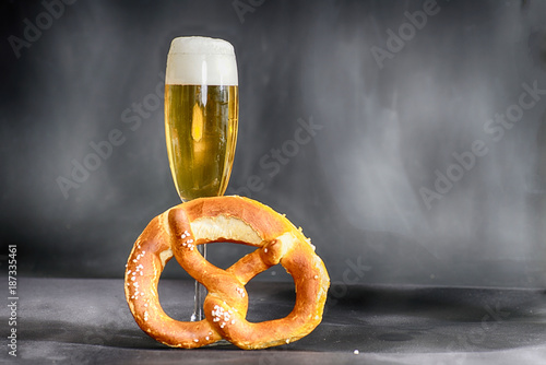 Fresh Butterbreze and a glass of beer photographed in the studio
 photo