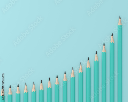 Creative flat lay design of crayons, Blue pencils on technical chart of financial expansion. wave pattern row on blue pastel background. minimal idea. business concept for control financial budget.