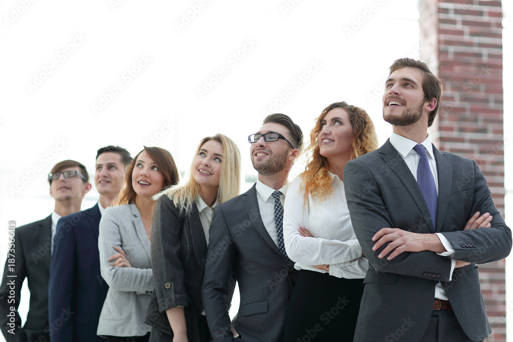 successful business team looking at copy space. successful business team looking at copy space.