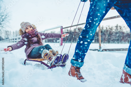 Dad with daughter outdoor in winter