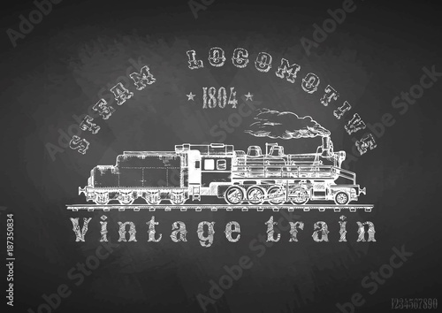 Vintage train on blackboard