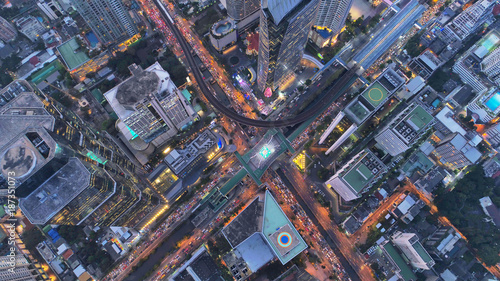 Top view city , Aerial view road , Expressway with car lots in the city in Thailand. Beautiful Street at downtown.Road roundabout © MAGNIFIER