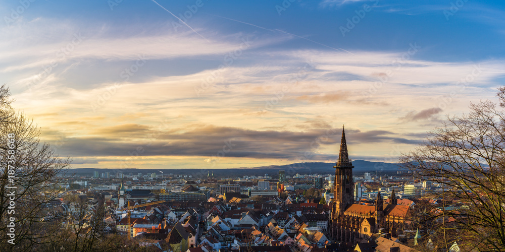 Germany, Baden-Wuerttemberg, Skyline of the City of Freiburg in warm evening sunlight from above extra large panorama