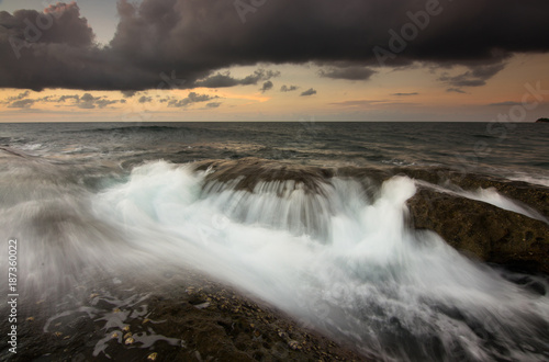 Dramatic waves at sunset in Kudat  Sabah Borneo  East Malaysia