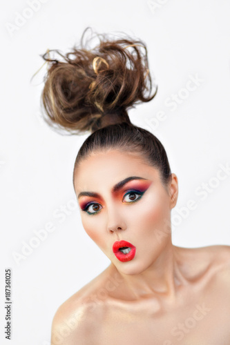 girl is surprised portrait of makeup creative on a white background