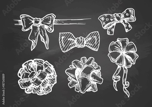 vintage bow knots on chalkboard