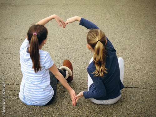 Children Making Heart with Hands