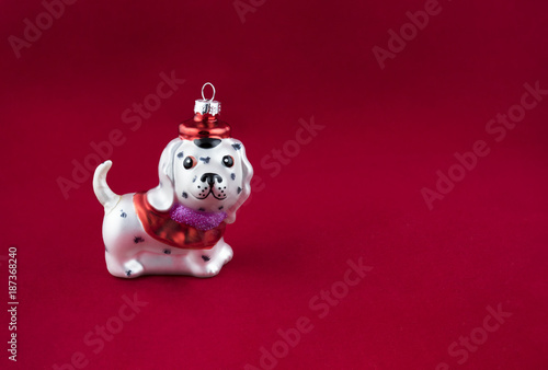 Christmas background and christmass balls. Christmas dog glass. Chinese New Year. © Elena
