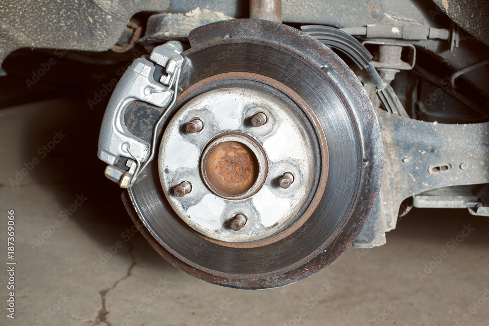 wheel suspension visible during tire change. wheel suspension visible during tire change.