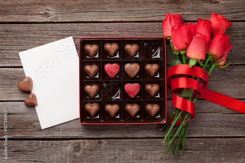 Valentines day with red roses and chocolate