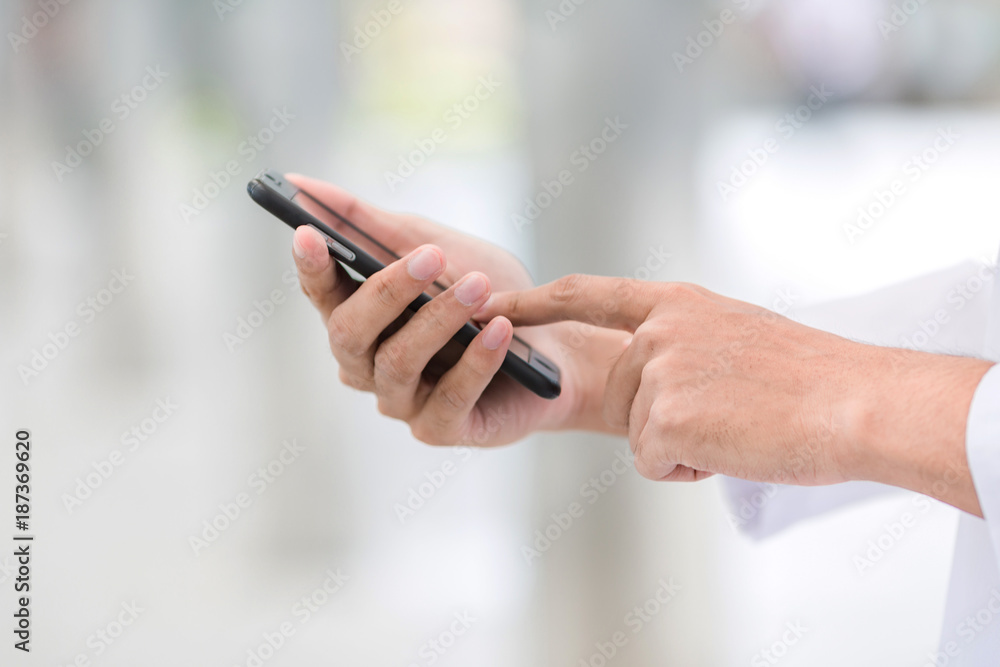 Arab business use mobile phone to connect to customer. Arab business use mobile phone to connect to customer.