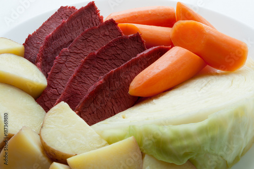 Corned Beef, Cabbage, Carrot and Potatoes on a white plate. Dinner Saint Patrick’s Day. Irish Food. Feast 17 March. photo