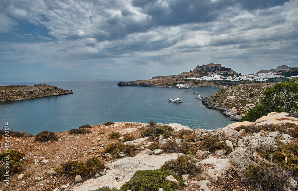 Medieval fortress and white houses of Lindos village in Rhodes. Medieval fortress and white houses of Lindos village in Rhodes.