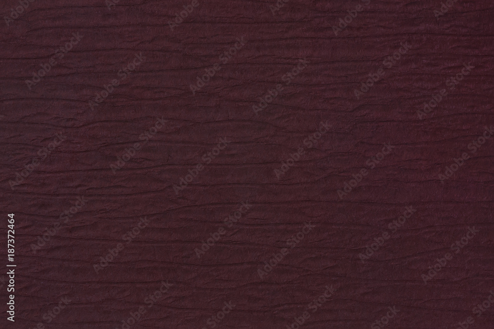 Fototapeta premium Burgundy paper texture with embossing and stamping