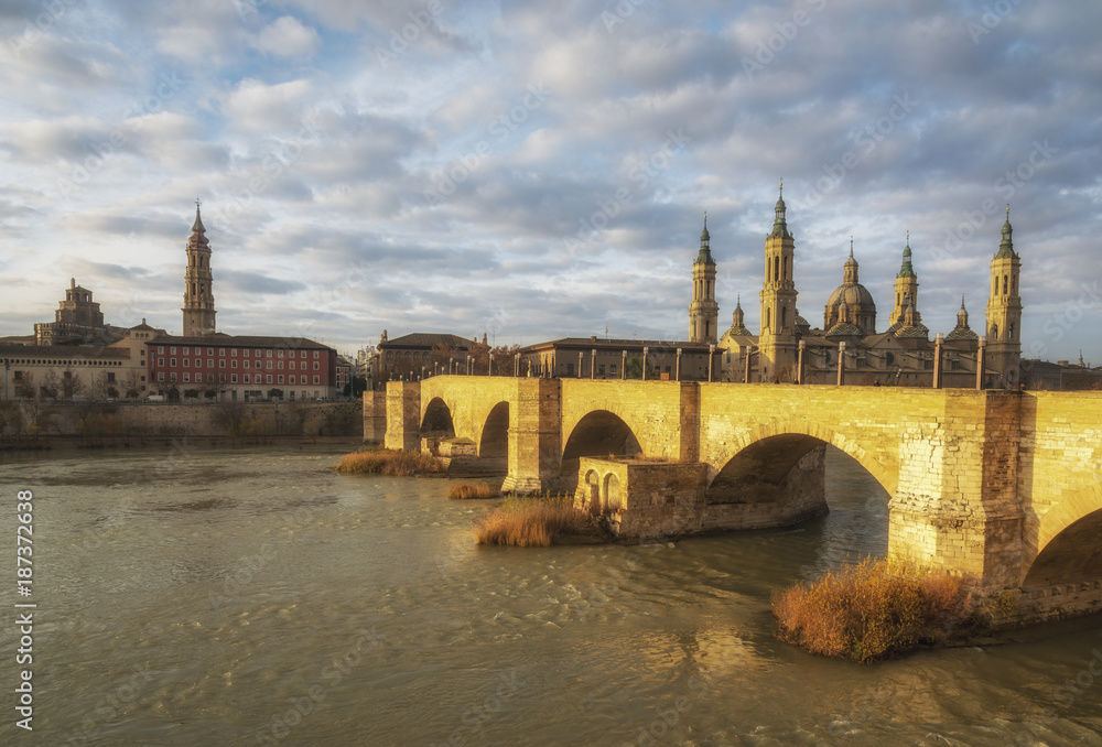 The Cathedral-Basilica and the Stone bridge on the Ebro River in Zaragoza, Spain.