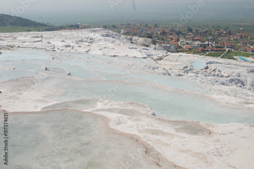 Ancient springs of Pamukkale,Turkey/is a natural and cultural UNESCO world heritage site, includes geothermal springs with water temperature of 36°C, water terraces formed of travertine, travel route 