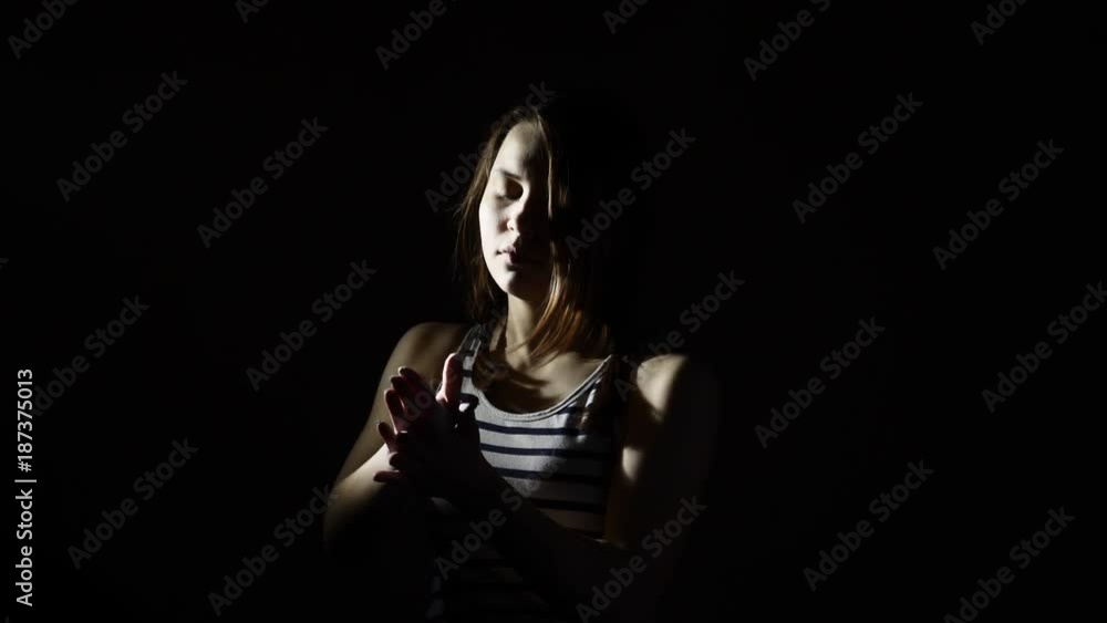 Teen girl with chalk in darkness before lift slow motion. Clapping hands and screaming. Teen girl with chalk in darkness before lift slow motion. Clapping hands and screaming.