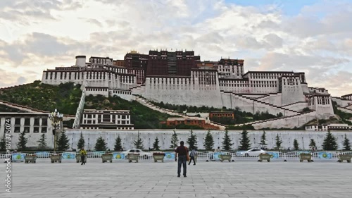 View of the majestic POTALA PALACE in Lhasa — iconic TIBETAN architecture and sacred Buddhist landmark with people in the foreground