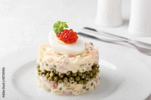 Russian Olivier salad with red caviar on top