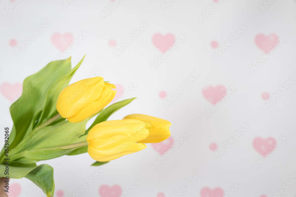 Yellow tulips, Valentine's background with hearts