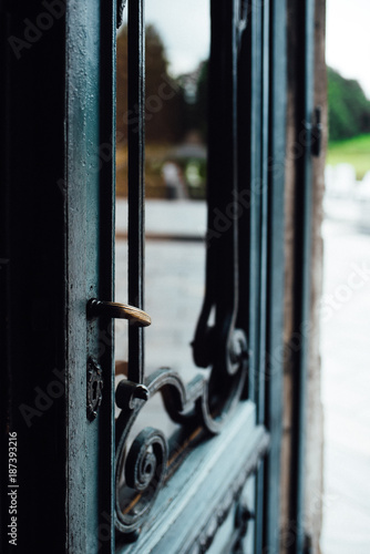 old wooden open door to the courtyard