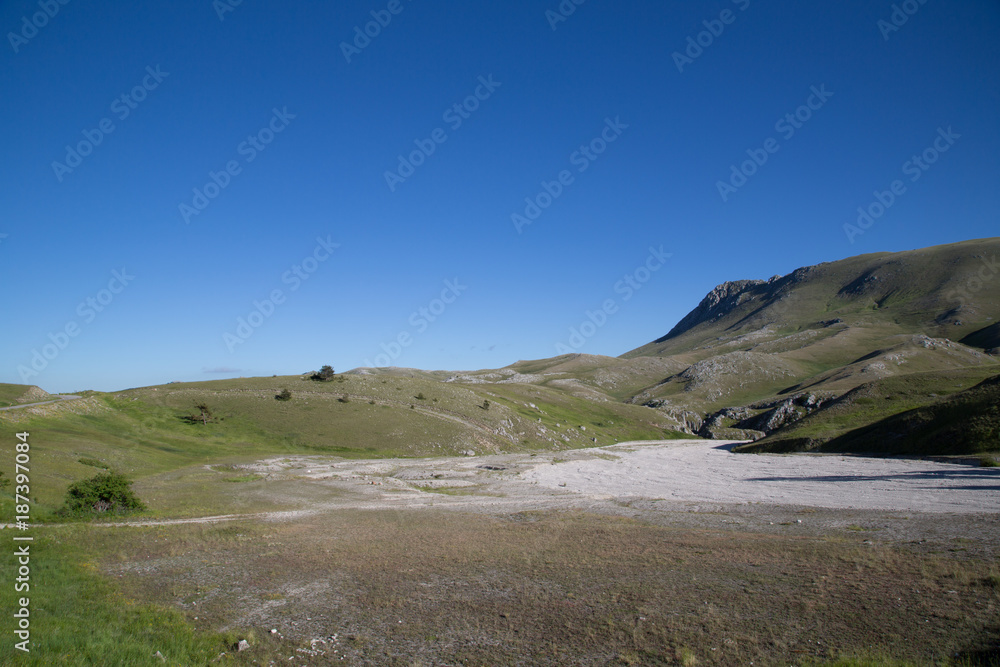 Cima di Monte Bolza, north flank, dry riverbed meltwater