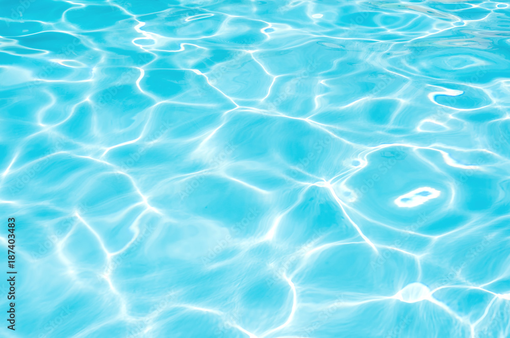 Wonderful blue and bright ripple water and surface in swimming pool, Beautiful motion gentle wave in pool