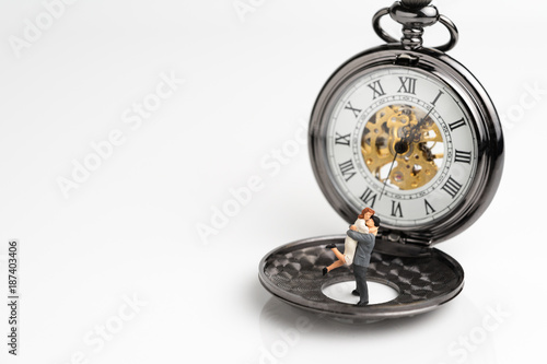 Fotografia Forever love timeless concept by miniature people couple standing on vintage poc