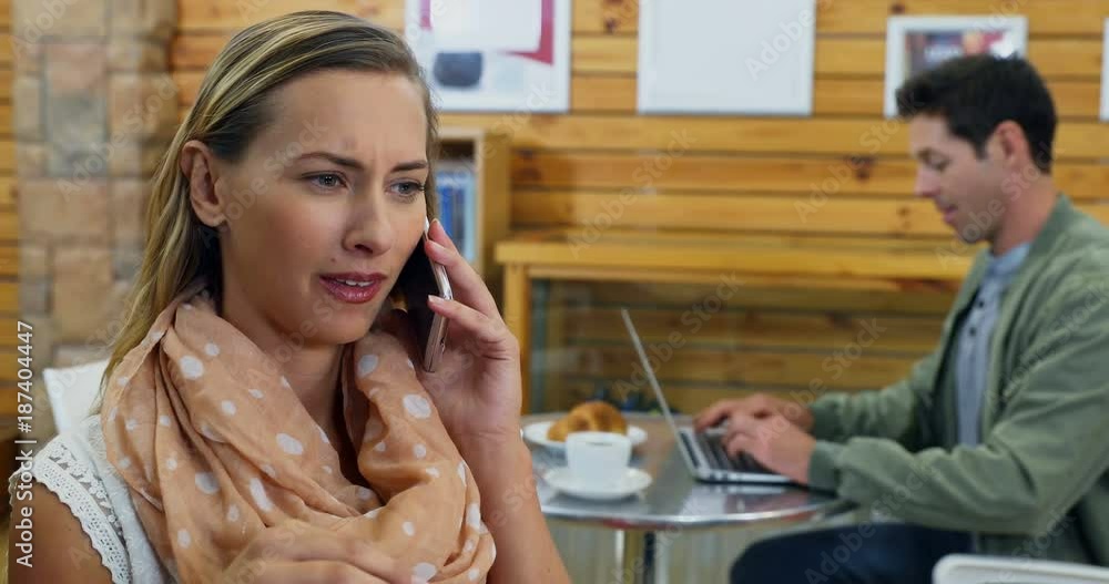 Beautiful woman talking on mobile phone Beautiful woman talking on mobile phone