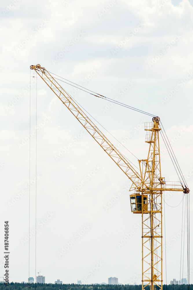Crane at construction site against sky Crane at construction site against sky