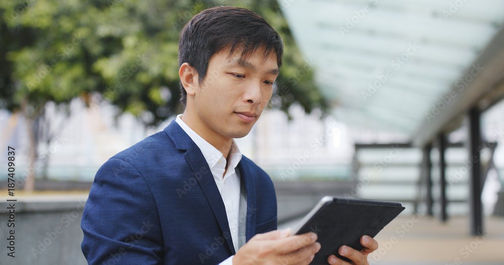 Businessman using tablet computer Businessman using tablet computer