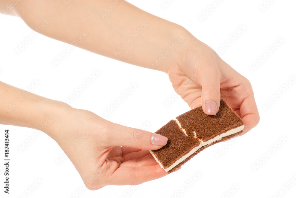 Obraz premium Chocolate cake candy biscuit milk in hand