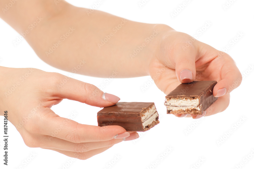 Fototapeta premium Chocolate cake candy biscuit milk in hand