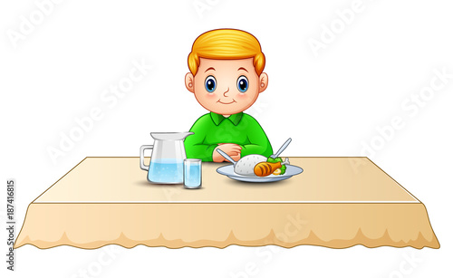 Cute little boy cartoon eating on dining table