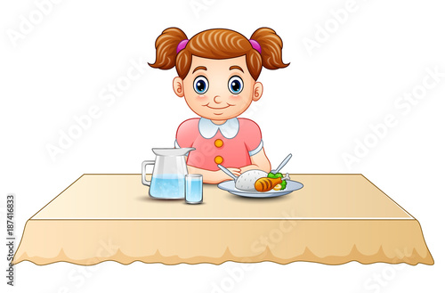 Cute little girl cartoon eating on dining table