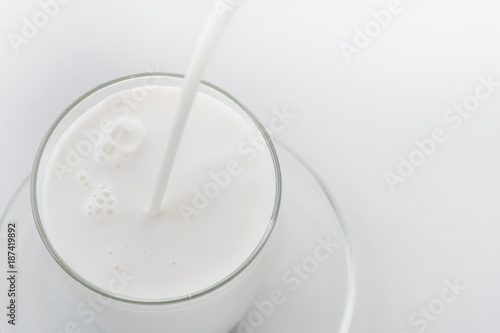 Pouring milk into glass 