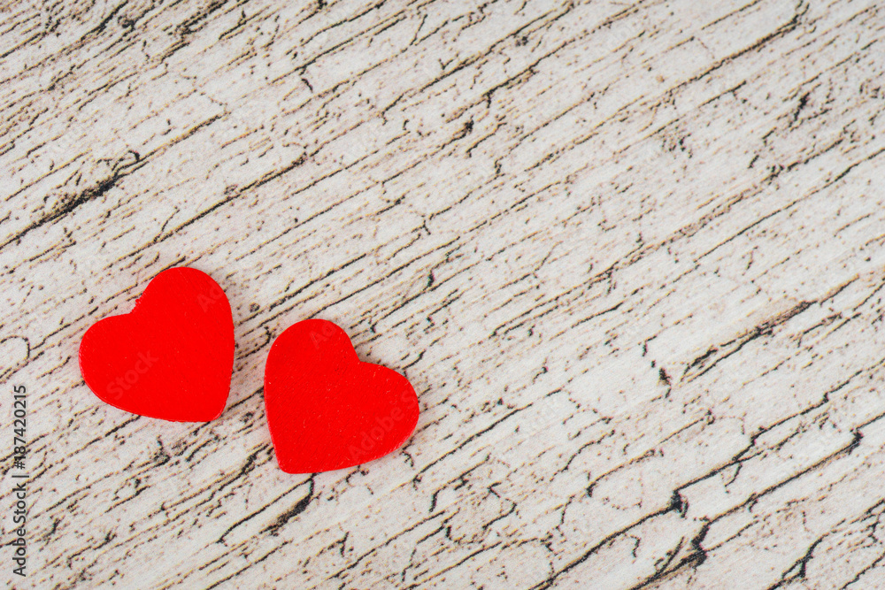 valentine's day card, two red hearts on white wooden rustic planks valentine's day card, two red hearts on white wooden rustic planks