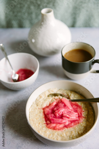 Breakfast of porridge with stewed rhubarb