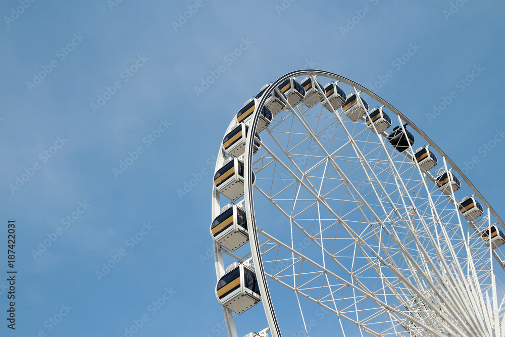 ferris wheel on blue sky