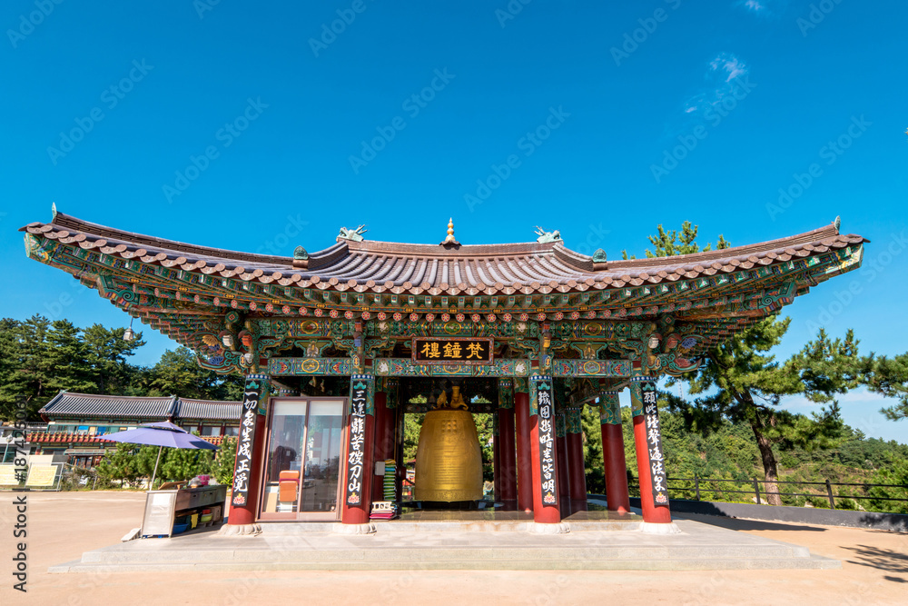 Fototapeta premium The golden bell of Hyuhyuam Hermitage in Yangyang.
