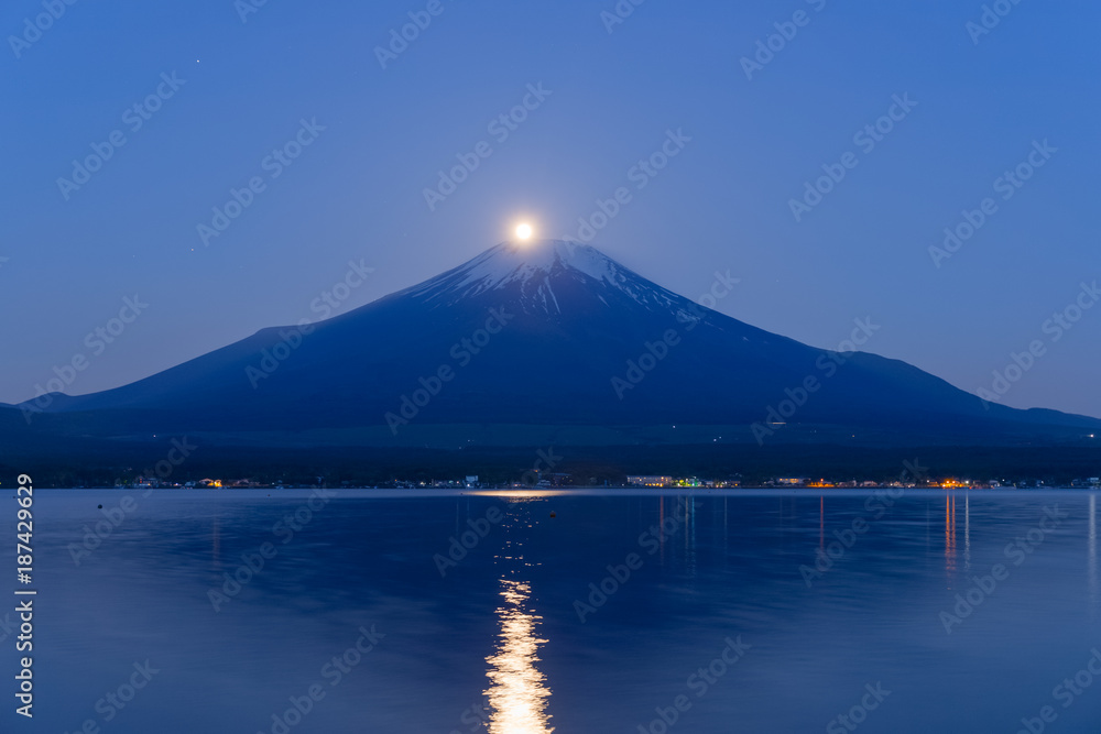 Pearl Fuji , Full moon overlaps the  Top of Mt. Fuji at Lake Yamanakako in spring morning
