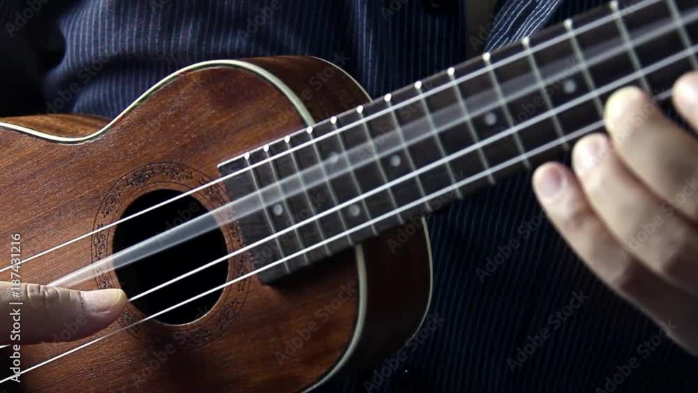 A man is playing ukulele in close up view, Footage Video A man is playing ukulele in close up view, Footage Video
