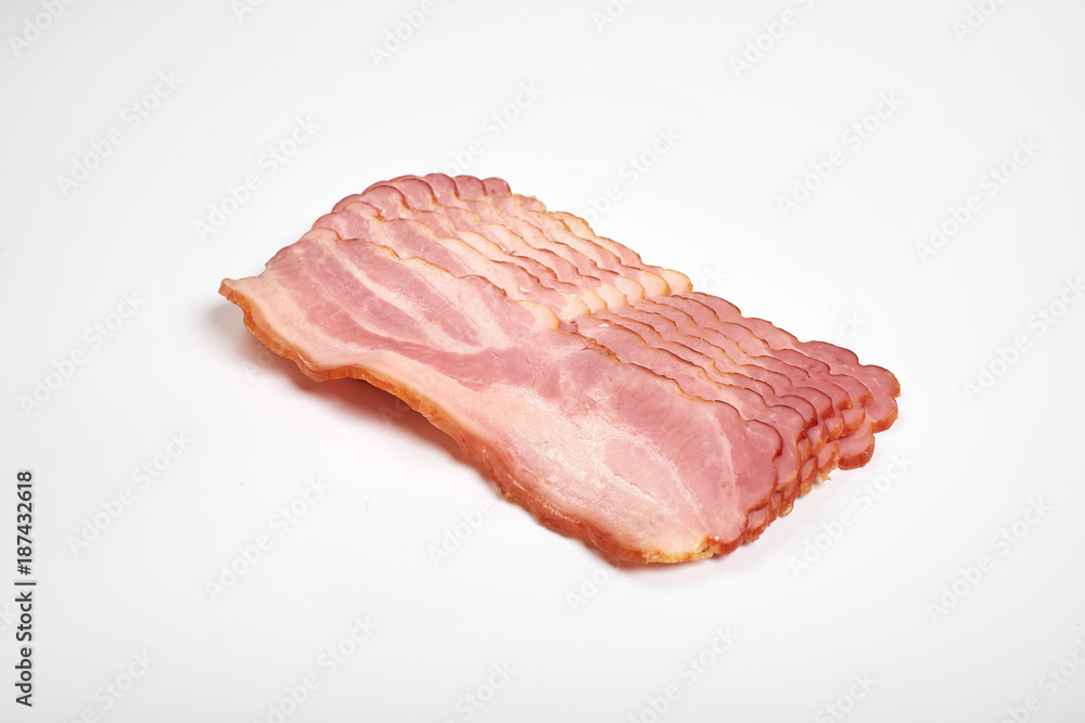 sliced pork bacon on a white background