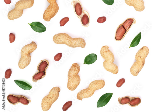 Peanuts with shells isolated on white background with copy space for your text, top view. Flat lay pattern