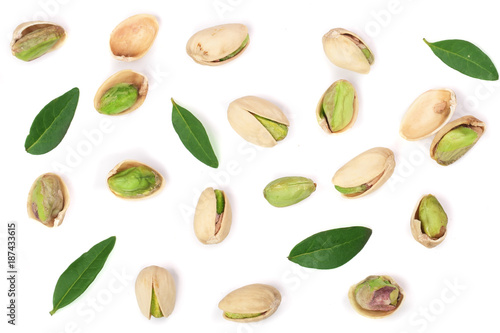 Pistachios isolated on white background with copy space for your text, top view. Flat lay pattern