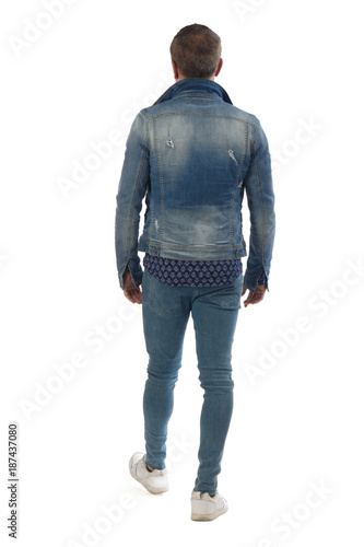 man dressed with blue jeans isolated on white background © curto