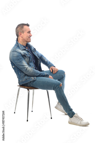 man sitting on a chair with white background photo