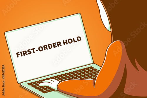 Woman looking at a laptop screen with the words first-order hold photo