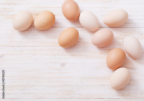 eggs on white wooden background